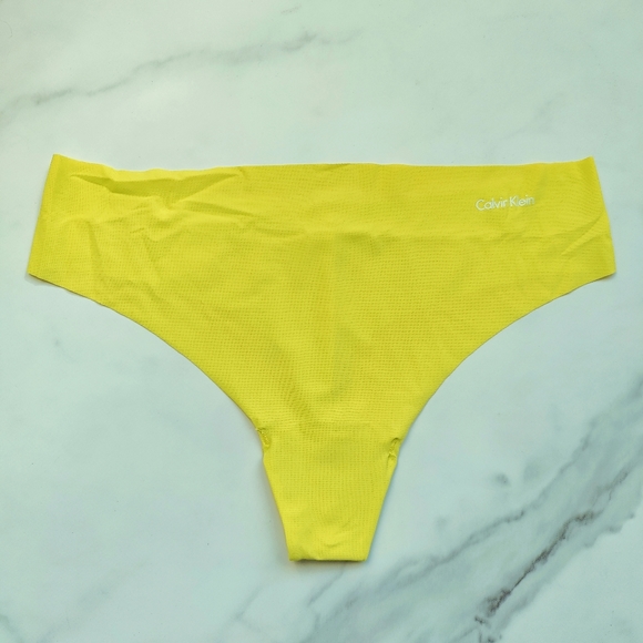 NWOT CALVIN KLEIN INVISIBLES THONG PANTY IN LEMON LIME SIZE LARGE - Picture 1 of 4